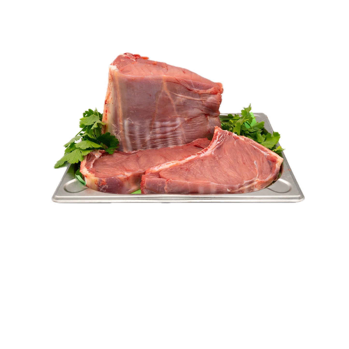 Plateau de côte de veau avec garniture de persil frais