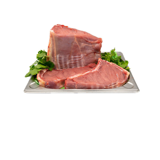 Plateau de côte de veau avec garniture de persil frais