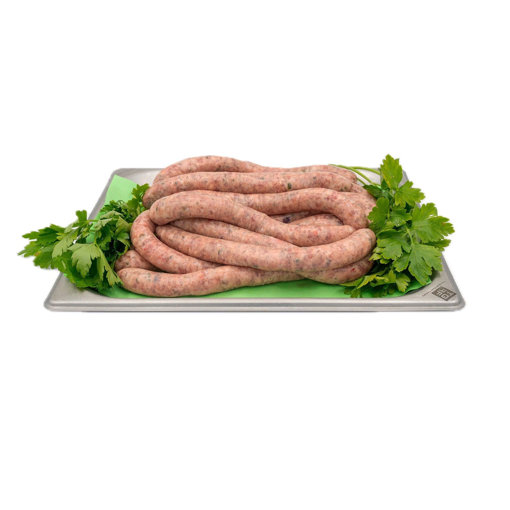 Saucisses de veau halal sur plateau avec persil - Boucherie Al-Itihad